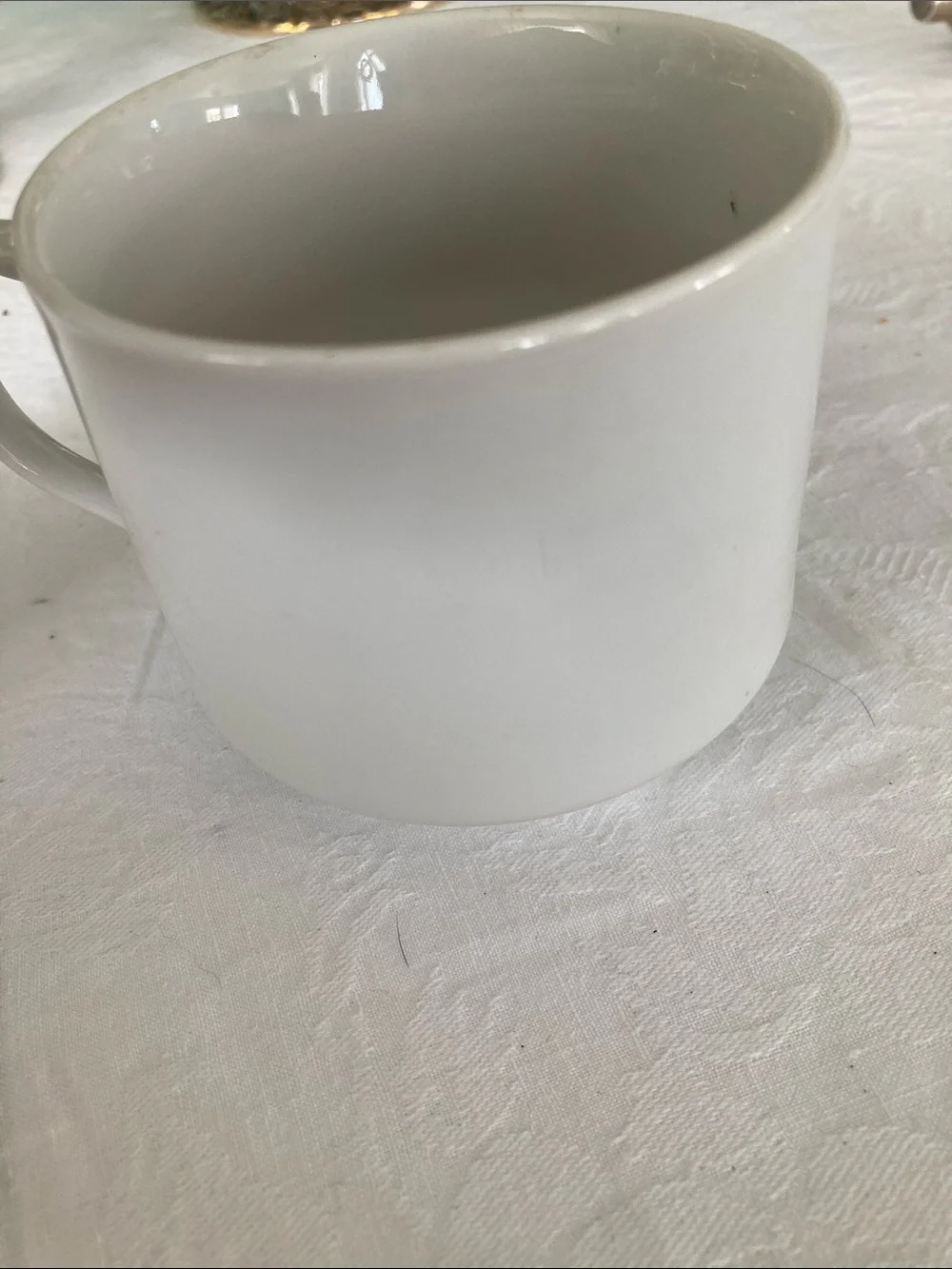 Vintage White Porcelain Cup with Gold Script and Orange Accents